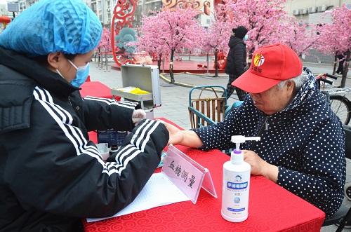 北京天桥街道开展“爱满京城”志愿服务一条街活动